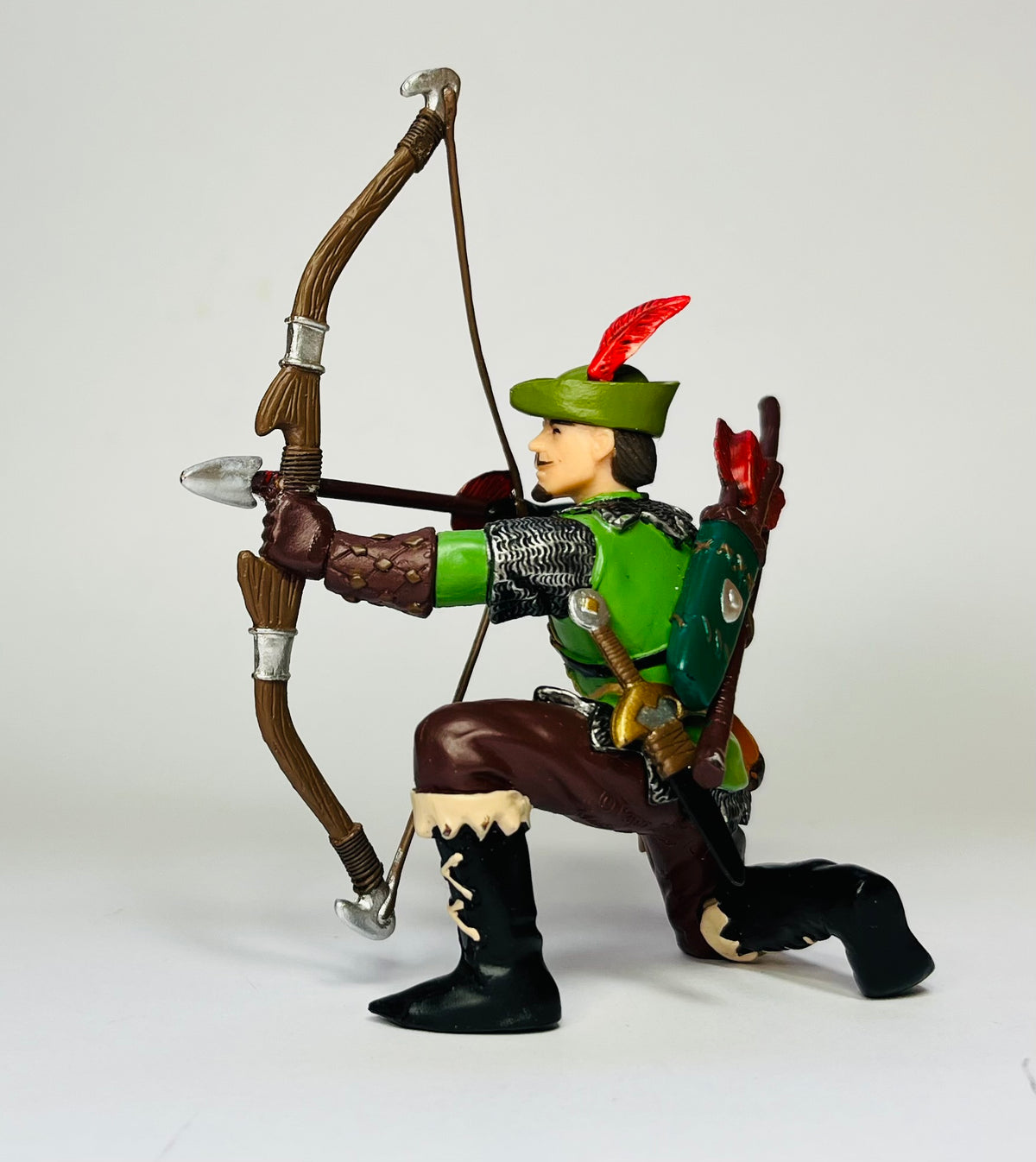 Papo Robin Hood kneeling.